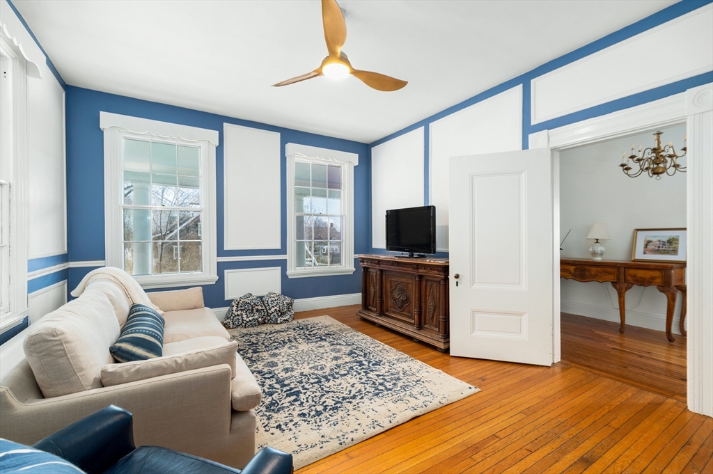 31 Beach Road Gloucester, MA 01930 - Photo 16 of 43 a living room with furniture and a flat screen tv