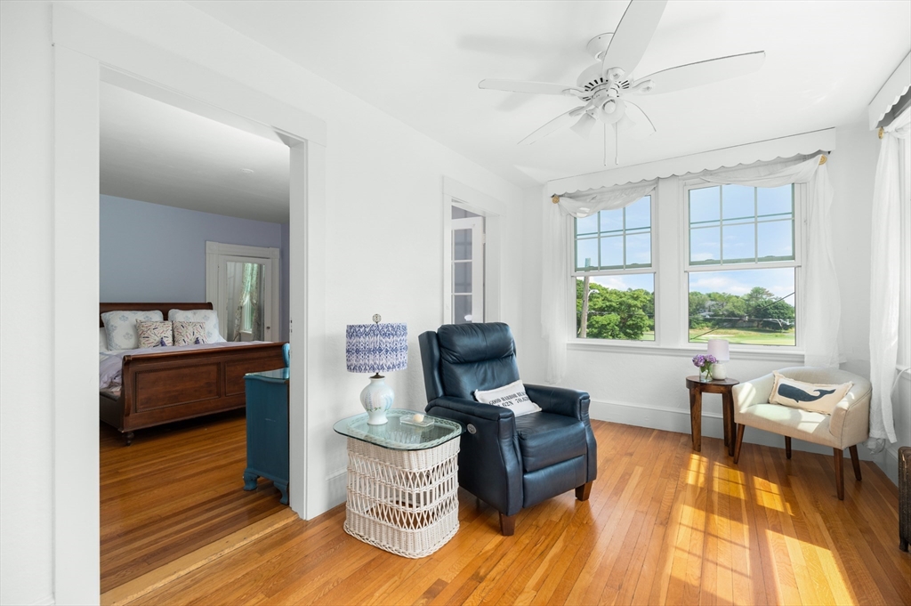 31 Beach Road Gloucester, MA 01930 - Photo 18 of 43 a living room with furniture and a large window