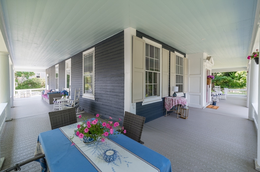 31 Beach Road Gloucester, MA 01930 - Photo 3 of 43 a living room with furniture and flowers