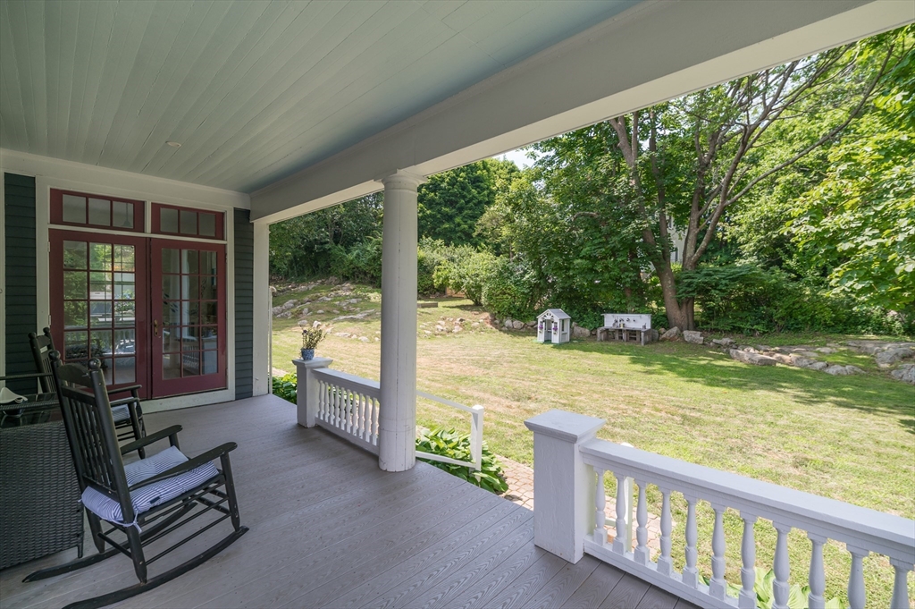 31 Beach Road Gloucester, MA 01930 - Photo 4 of 43 a view of a two chairs in the balcony