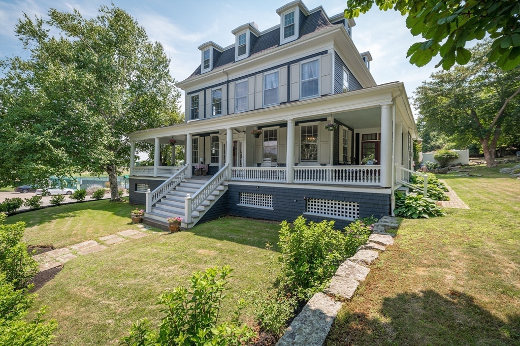 31 Beach Road Gloucester, MA 01930 - Photo 42 of 43 a view of a house with backyard porch and sitting area