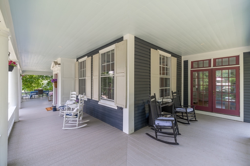 31 Beach Road Gloucester, MA 01930 - Photo 5 of 43 a living room with furniture and large windows