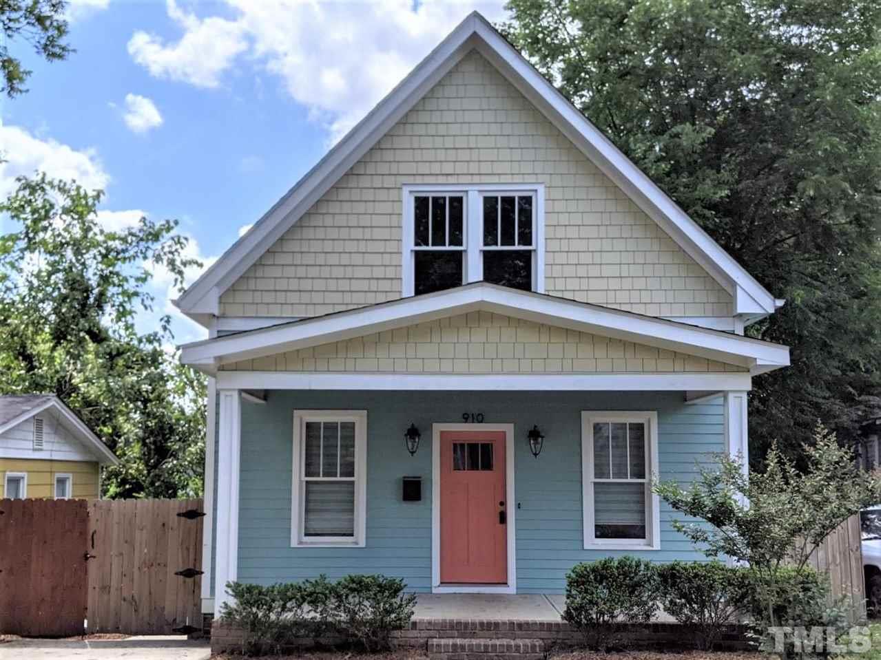 910 South Person Street Raleigh, NC 27601 - Photo 1 of 30 a view of a white house next to a yard