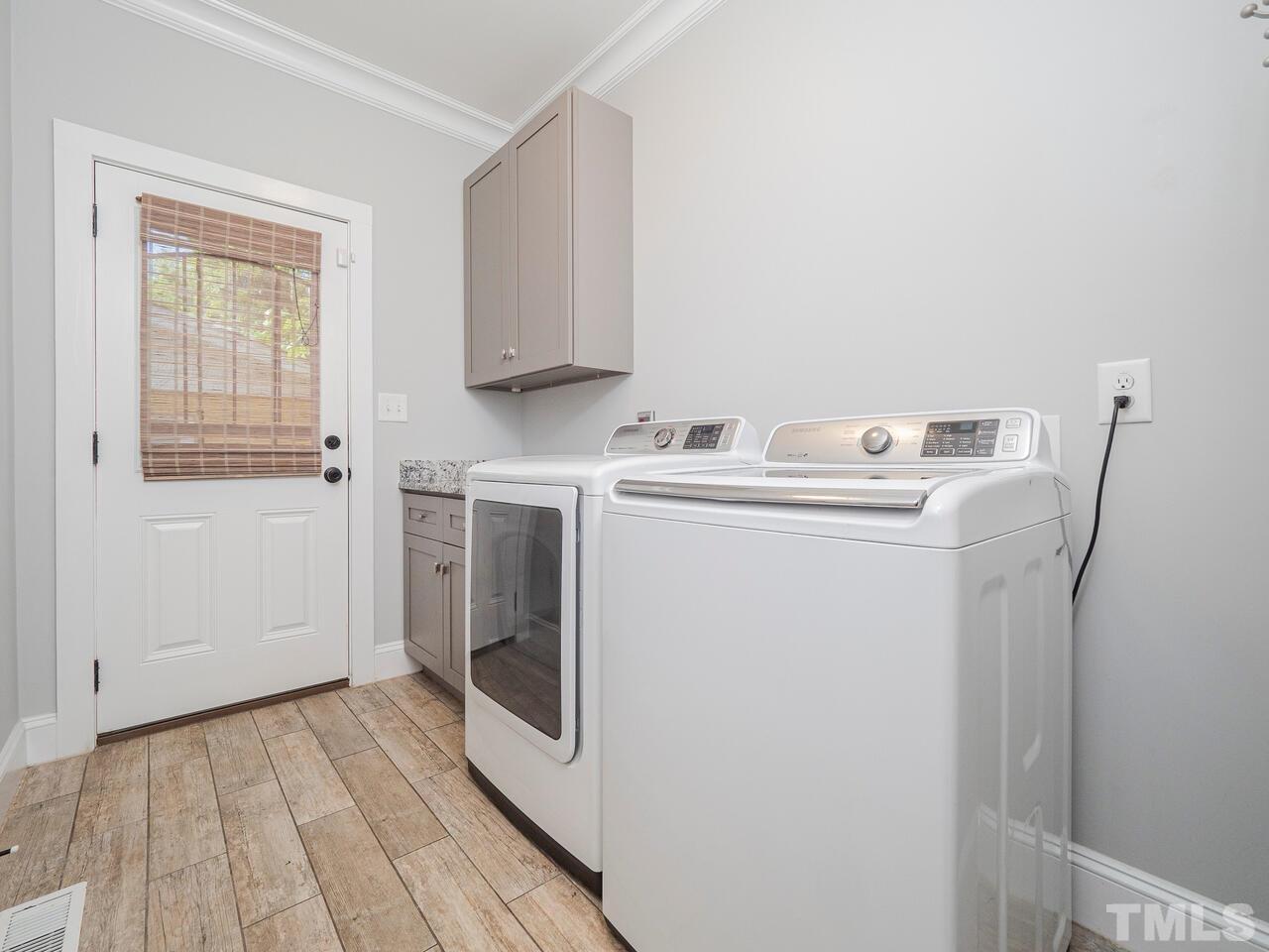 910 South Person Street Raleigh, NC 27601 - Photo 13 of 30 a utility room with dryer and washer