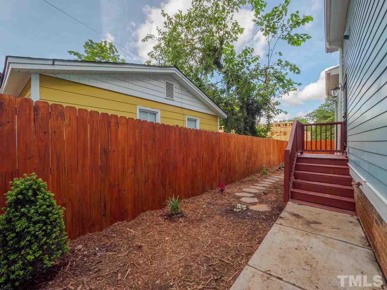 910 South Person Street Raleigh, NC 27601 - Photo 24 of 30 a view of a backyard with a deck