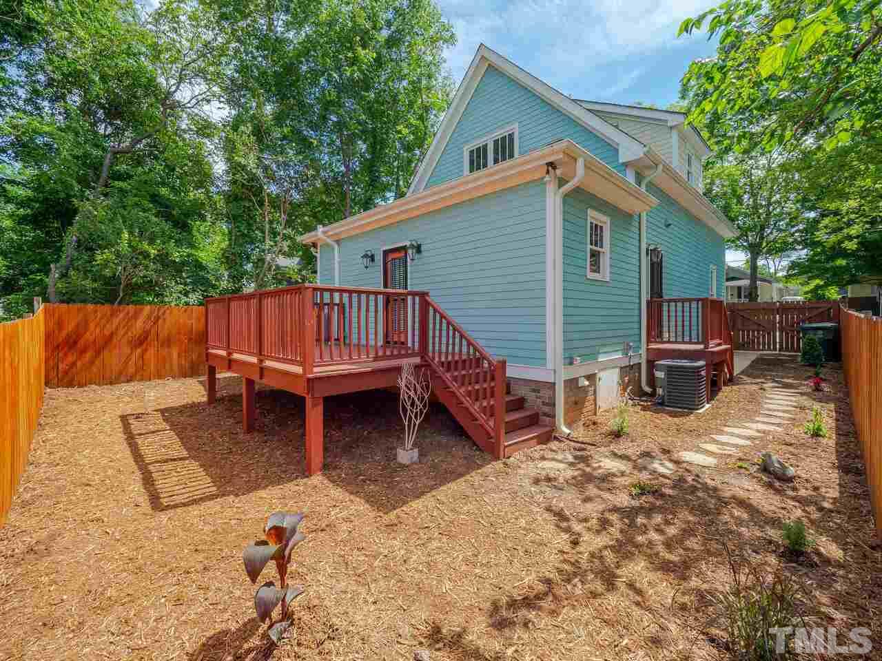 910 South Person Street Raleigh, NC 27601 - Photo 26 of 30 a view of backyard with deck and outdoor seating
