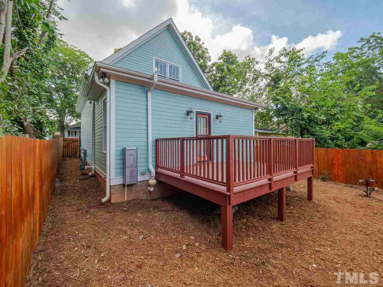 910 South Person Street Raleigh, NC 27601 - Photo 27 of 30 a view of a house with a yard and deck in backyard