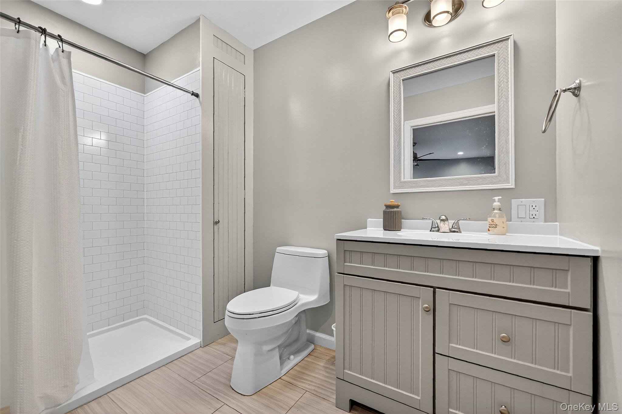 334 Greeves Road New Hampton, NY 10958 - Photo 12 of 45 a bathroom with a sink a toilet and shower