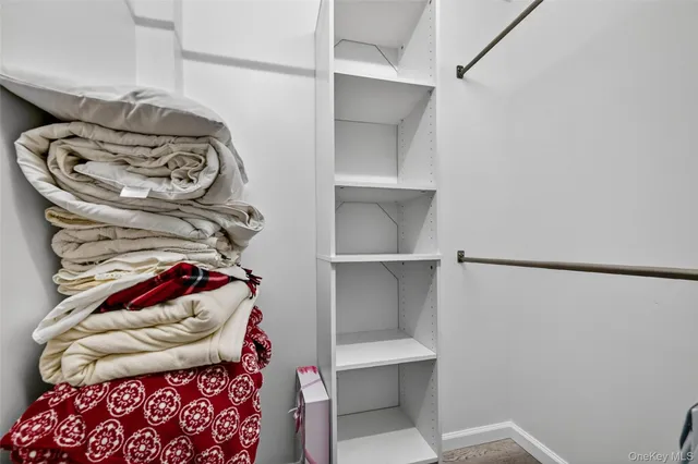 a view of a room with racks on the wall