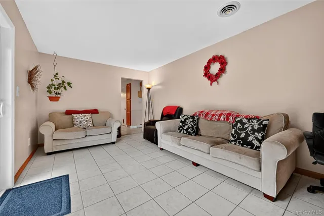 a living room with furniture and a couch