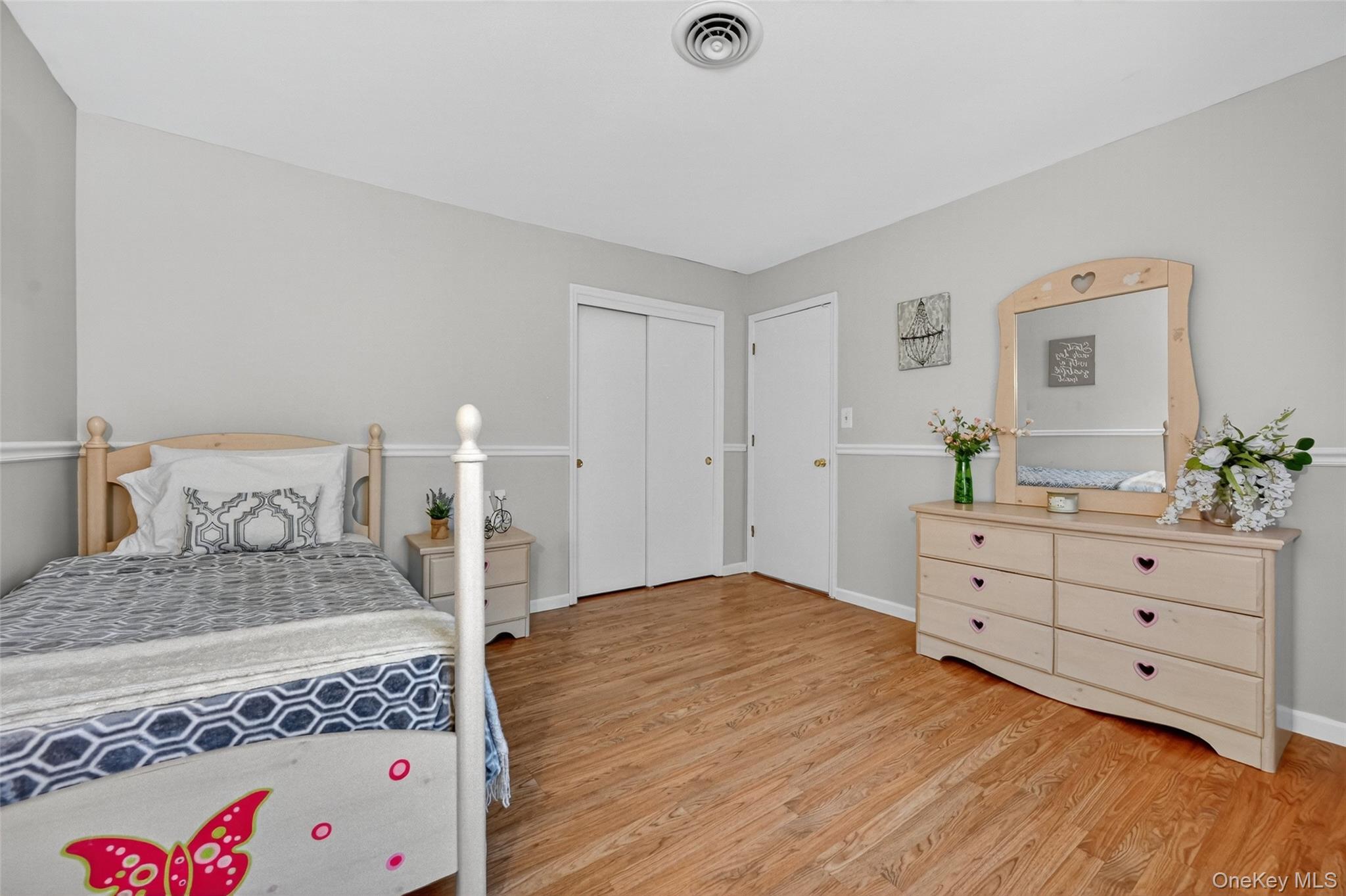 334 Greeves Road New Hampton, NY 10958 - Photo 19 of 45 a bedroom with a large bed and a dresser