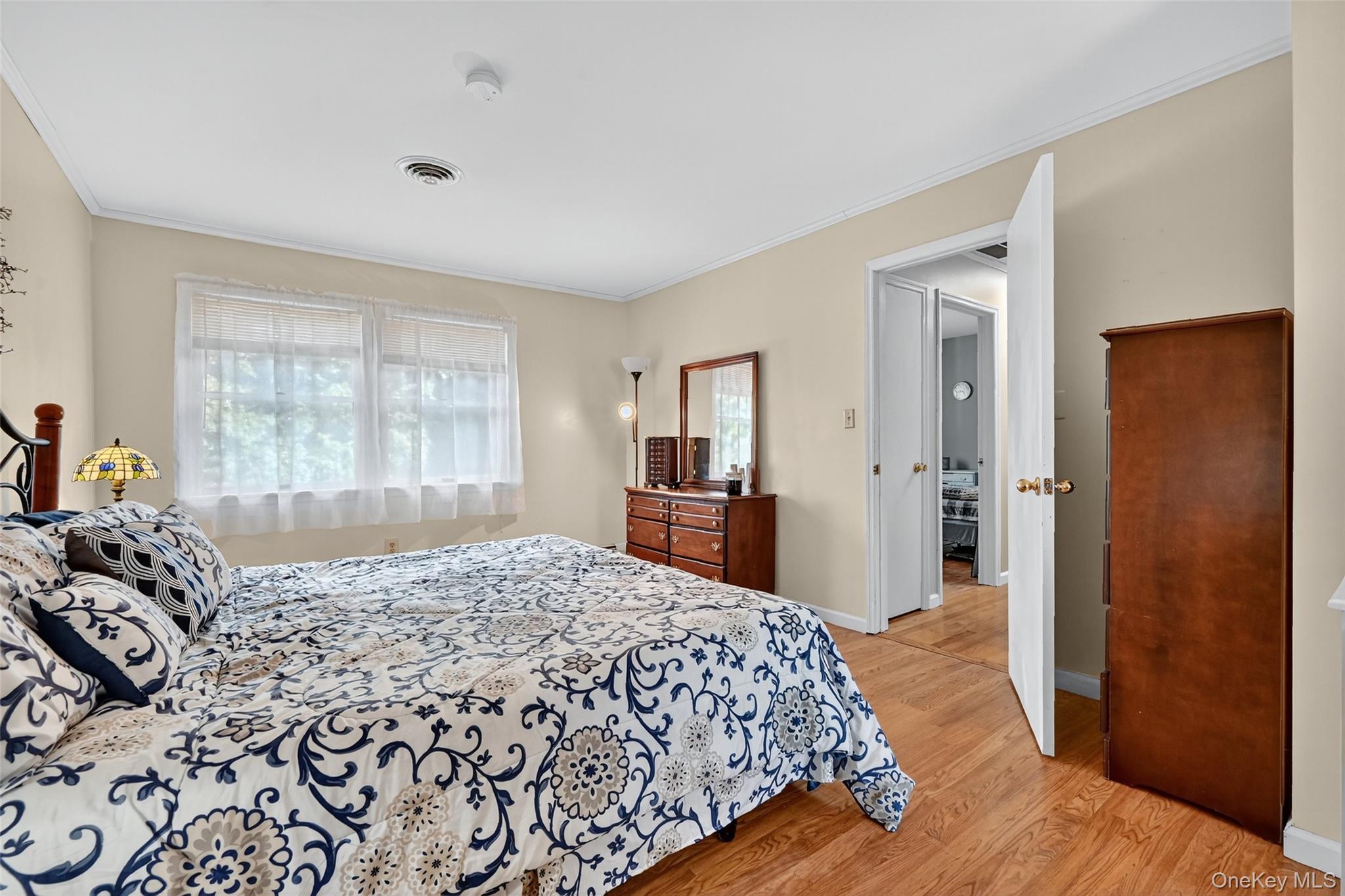 334 Greeves Road New Hampton, NY 10958 - Photo 22 of 45 a bedroom with a large bed and a dresser