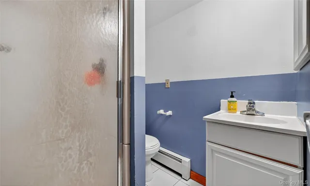 a bathroom with a sink and a toilet