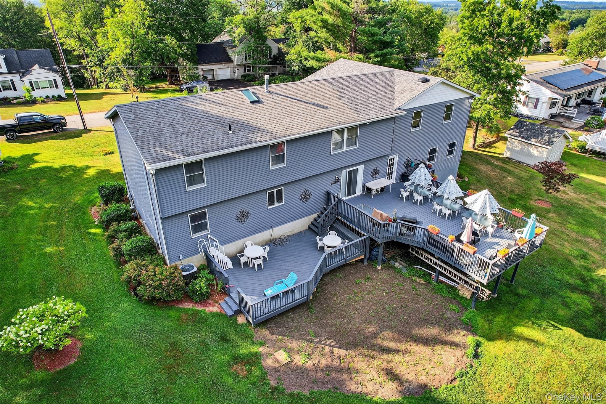 334 Greeves Road New Hampton, NY 10958 - Photo 39 of 45 an aerial view of a house with swimming pool garden and patio