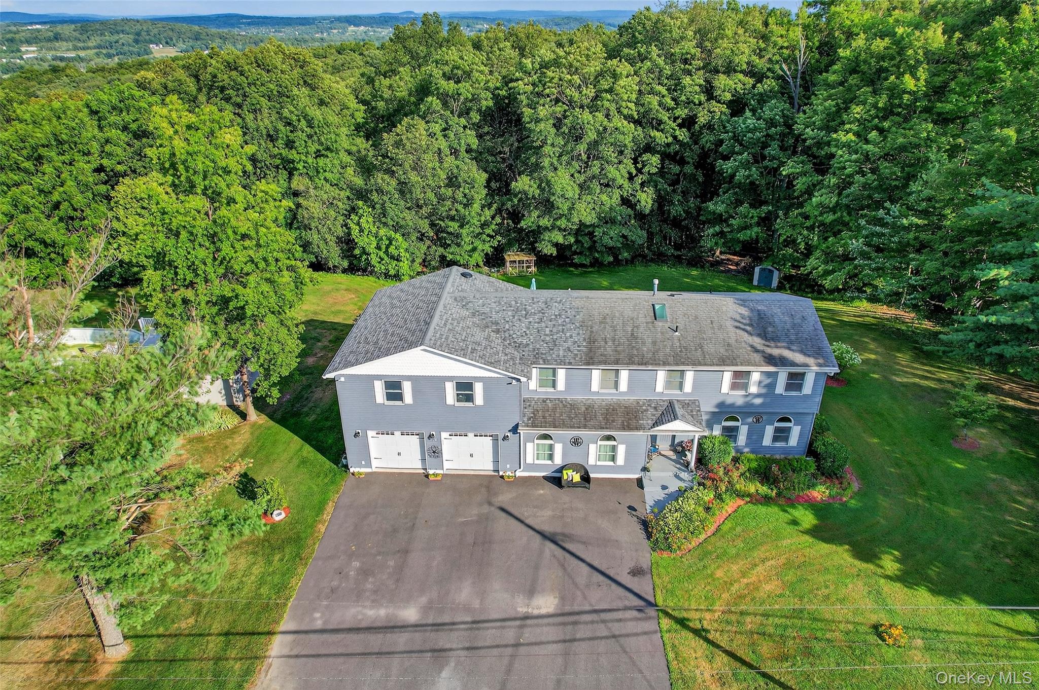 334 Greeves Road New Hampton, NY 10958 - Photo 41 of 45 an aerial view of a house with yard patio and green space