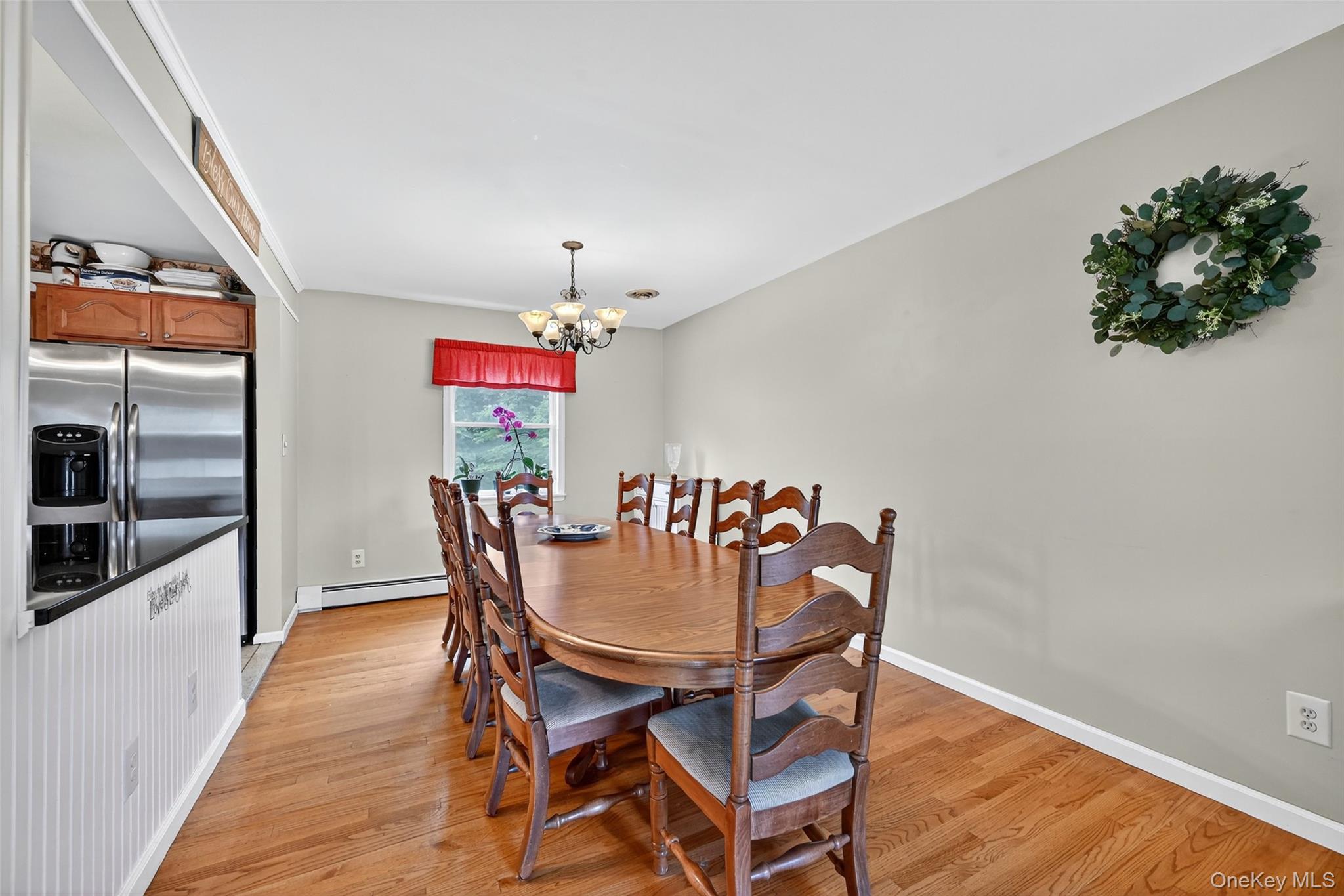 334 Greeves Road New Hampton, NY 10958 - Photo 6 of 45 a view of a dining room with furniture and wooden floor