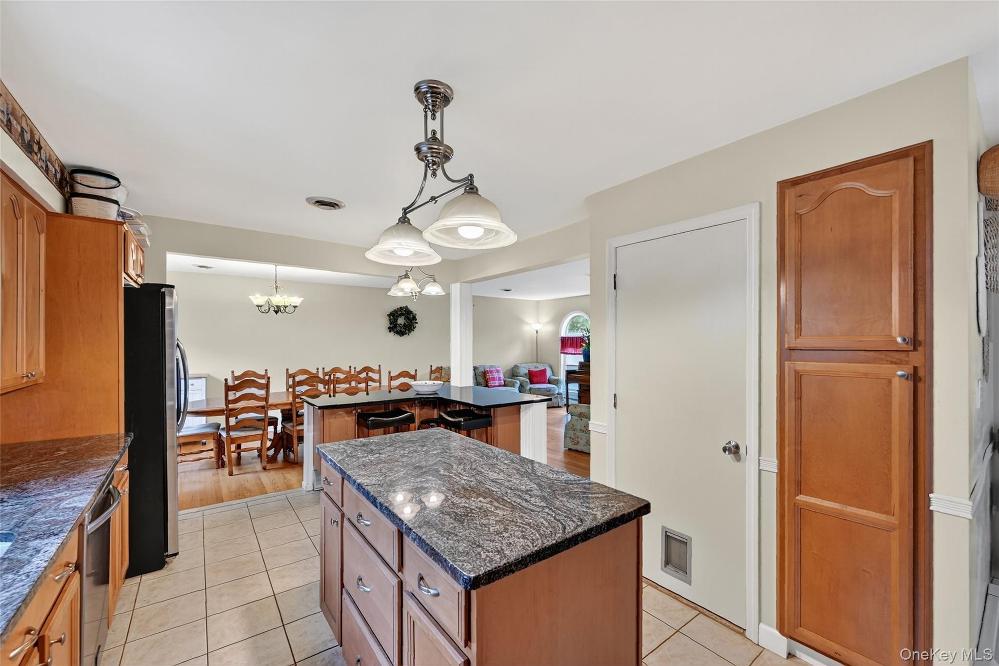 334 Greeves Road New Hampton, NY 10958 - Photo 8 of 45 a kitchen with stainless steel appliances granite countertop a sink and a refrigerator