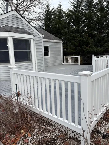 a back view of a house with a small yard