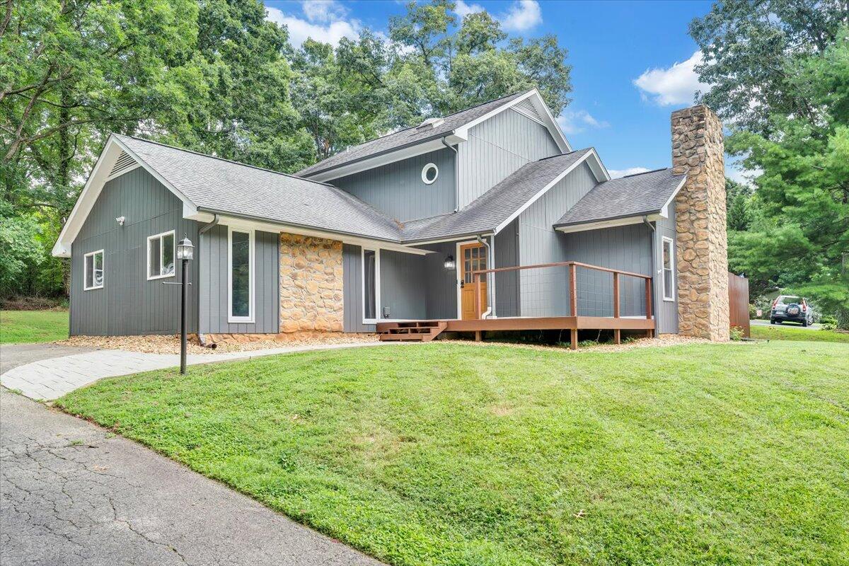 422 Willow Creek Road Rocky Mount, VA 24151 - Photo 1 of 70 a white house that has a small yard next to a road