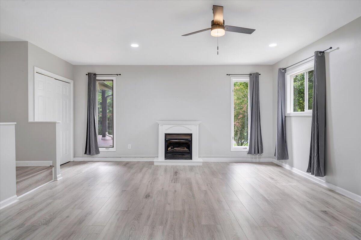 422 Willow Creek Road Rocky Mount, VA 24151 - Photo 32 of 70 a view of a livingroom with wooden floor a fireplace and window