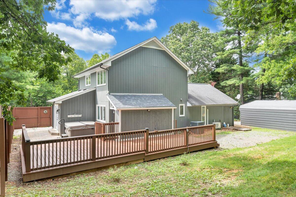 422 Willow Creek Road Rocky Mount, VA 24151 - Photo 50 of 70 a view of a house with a yard and a garden
