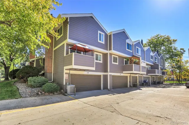 a view of a building with a street