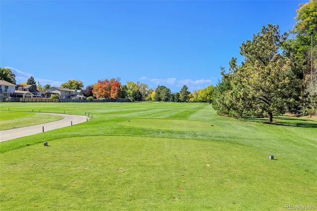 a view of a golf course with a trees