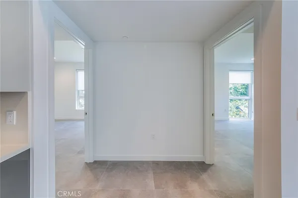 an empty room with a hallway