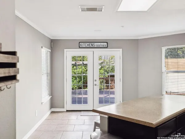 a kitchen with a sink and a window