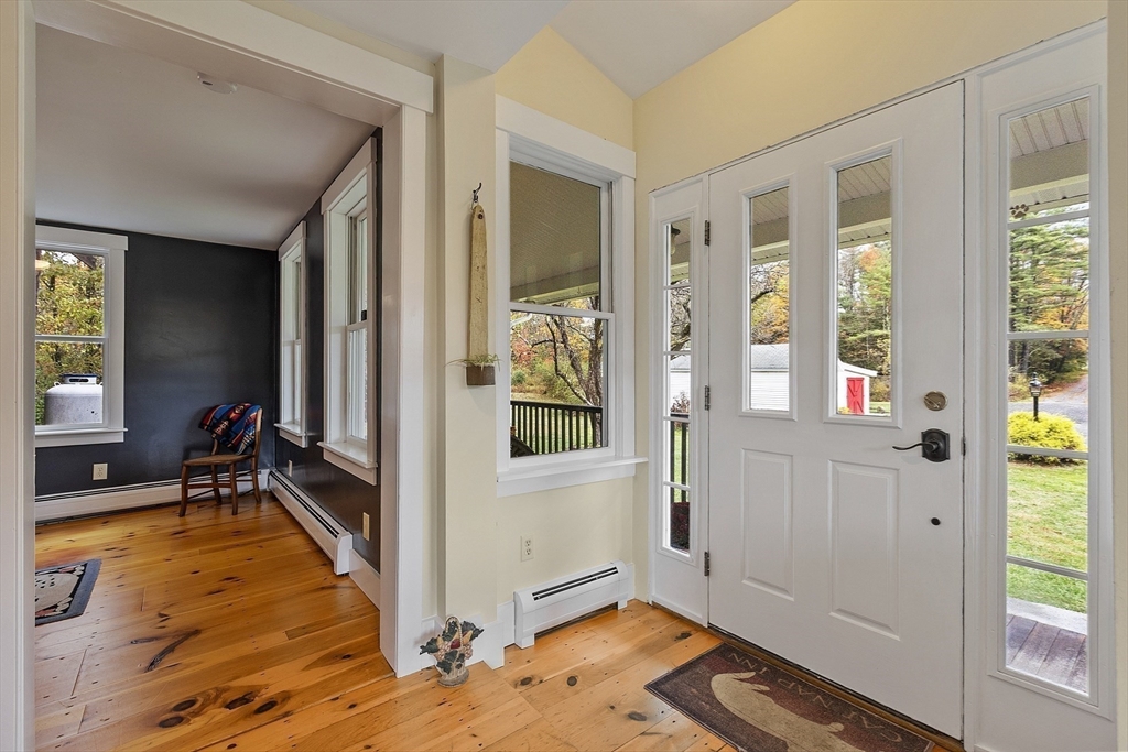 4 Elm Avenue Royalston, MA 01368 - Photo 13 of 42 a view of a livingroom with wooden floor and a balcony