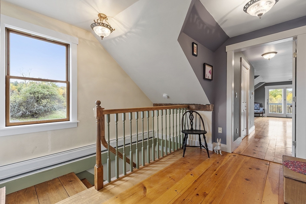 4 Elm Avenue Royalston, MA 01368 - Photo 27 of 42 a view of a hallway with wooden floor and staircase
