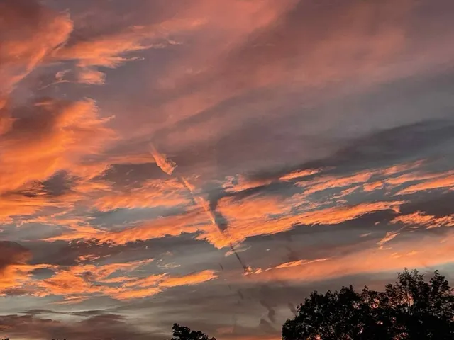 a bathroom with a tub and a window