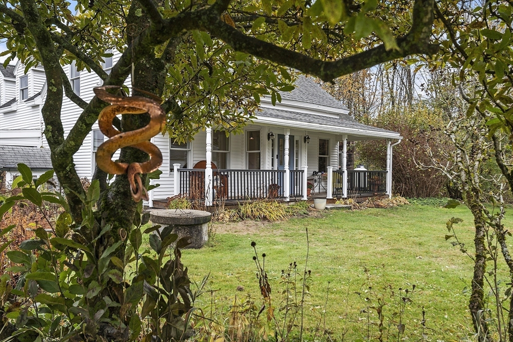 4 Elm Avenue Royalston, MA 01368 - Photo 4 of 42 front view of a house with a garden