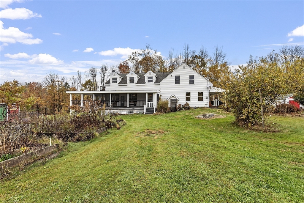 4 Elm Avenue Royalston, MA 01368 - Photo 6 of 42 a front view of a house with a garden