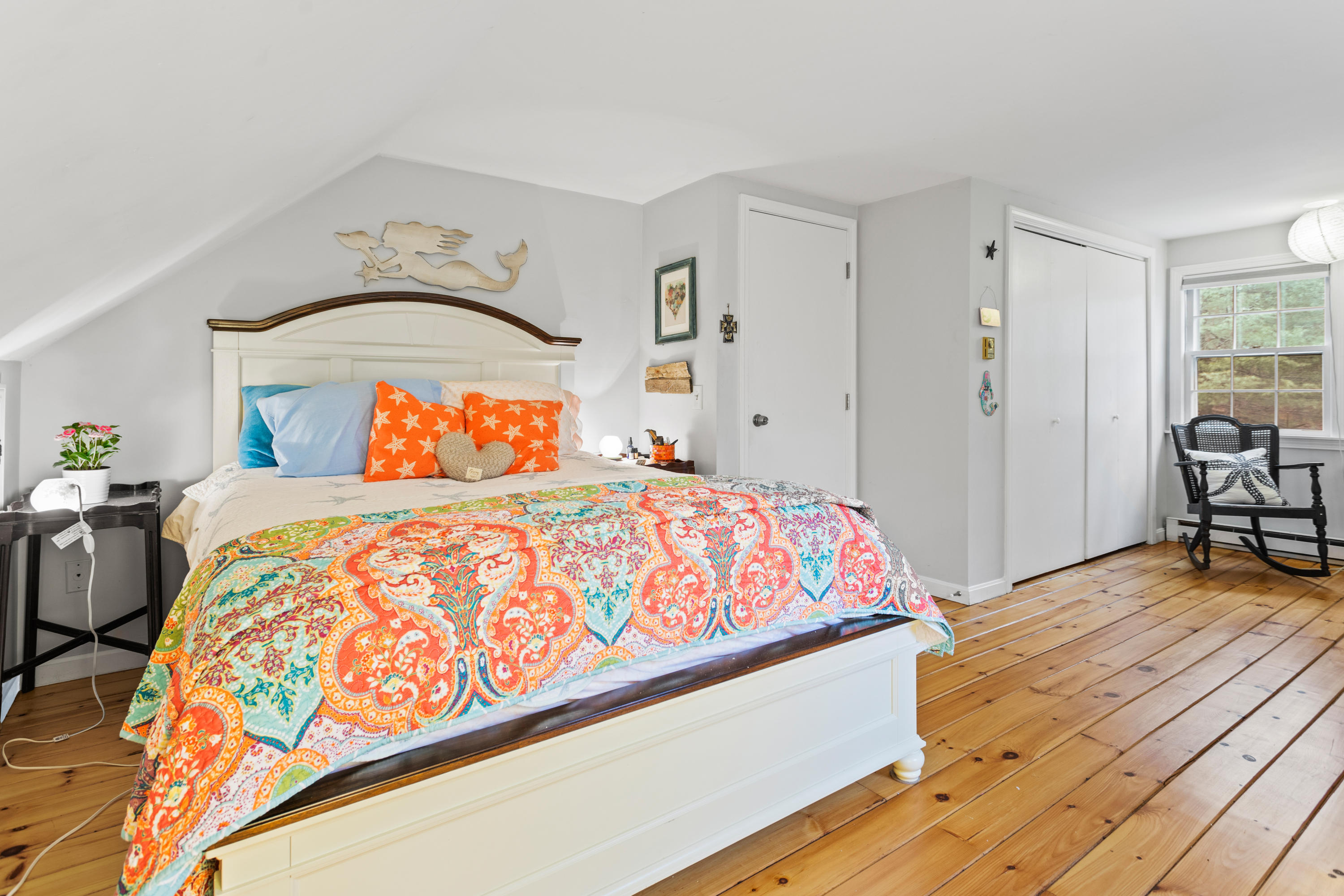 6 Padlock Lane Centerville, MA 02632 - Photo 17 of 29 a bedroom with a bed and wooden floor