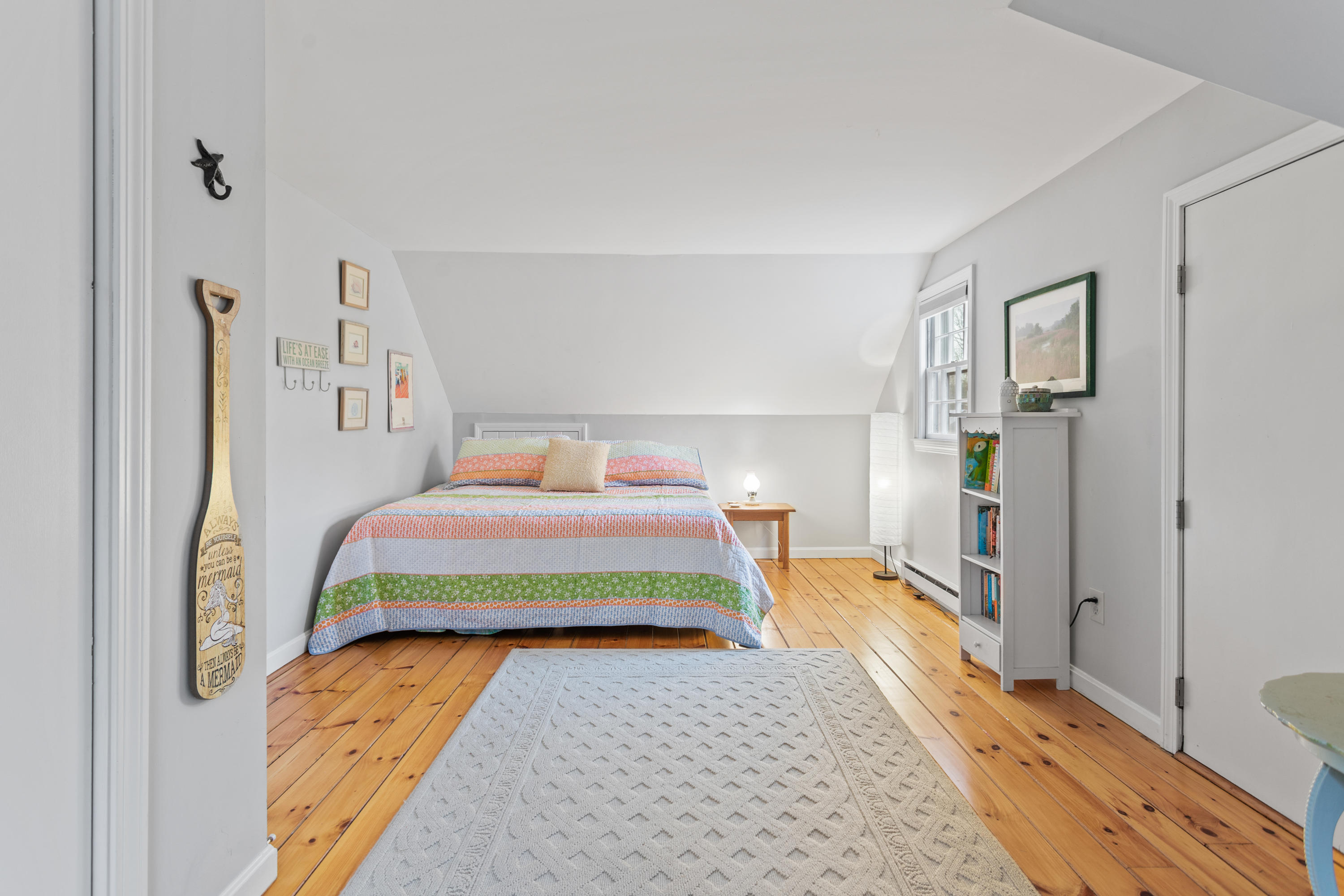 6 Padlock Lane Centerville, MA 02632 - Photo 19 of 29 a bedroom with a bed and a table in it