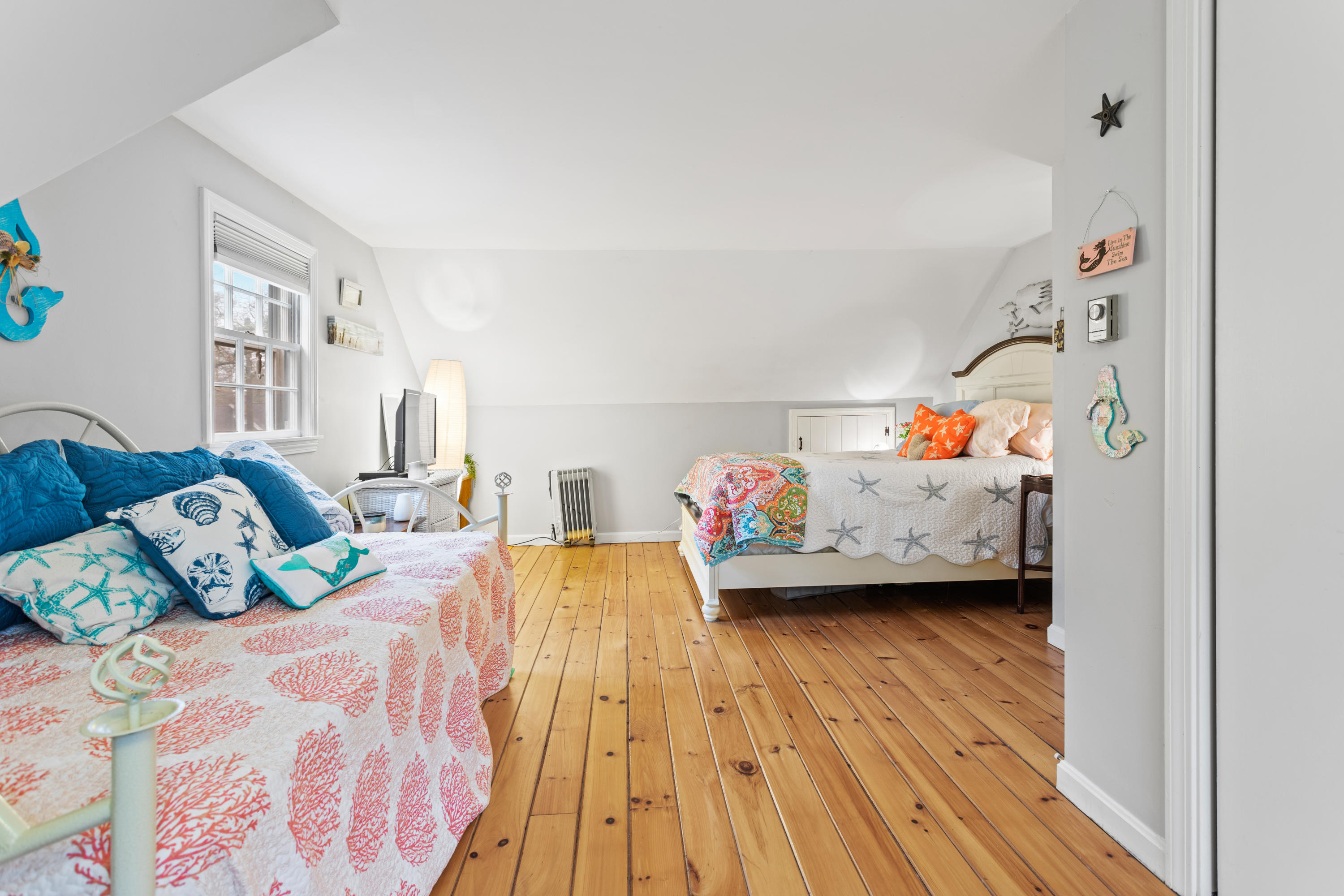 6 Padlock Lane Centerville, MA 02632 - Photo 21 of 29 a bedroom with a bed and wooden floor