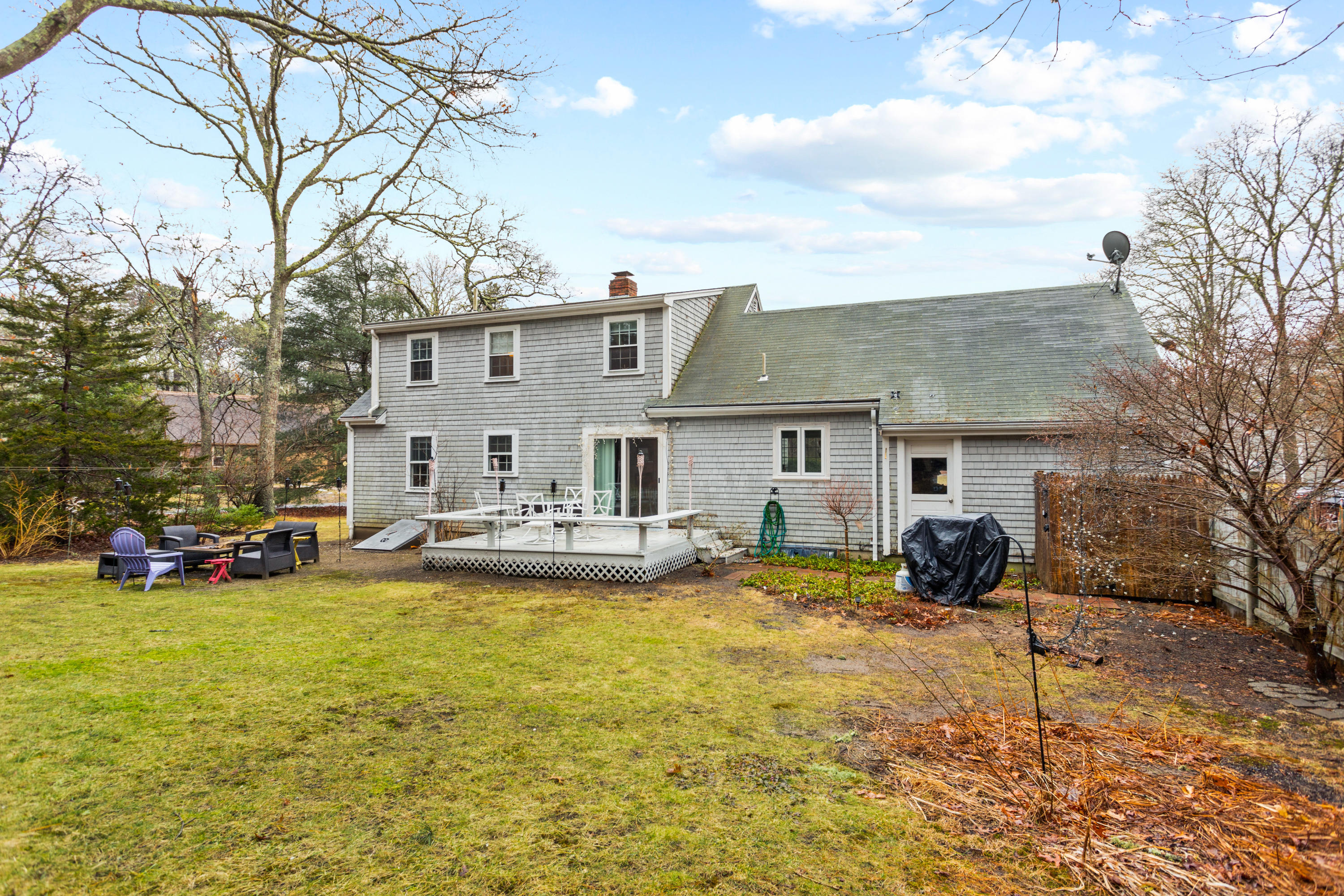 6 Padlock Lane Centerville, MA 02632 - Photo 23 of 29 a view of a house with swimming pool and sitting area