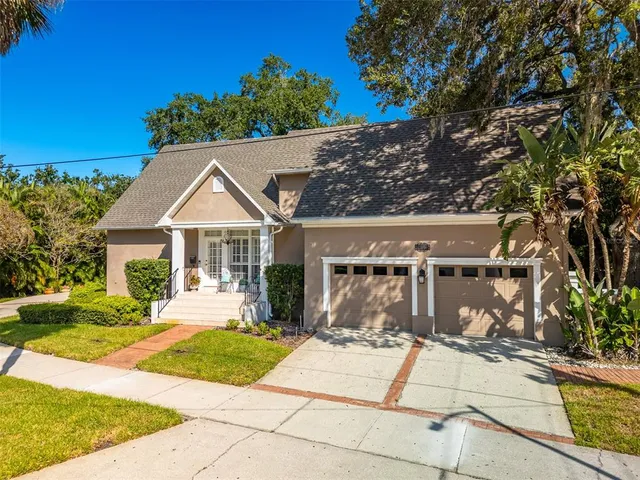 an aerial view of a house with a garden