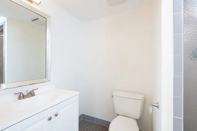 a bathroom with a sink and a toilet