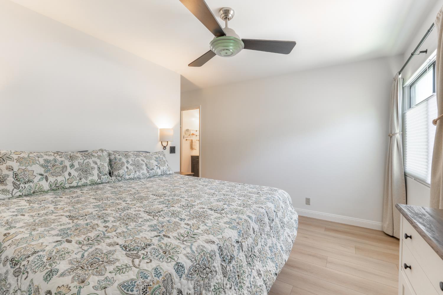 211 North Carrillo Road, Unit E Ojai, CA 93023 - Photo 20 of 28 Primary bedroom leading to ensuite bathroom