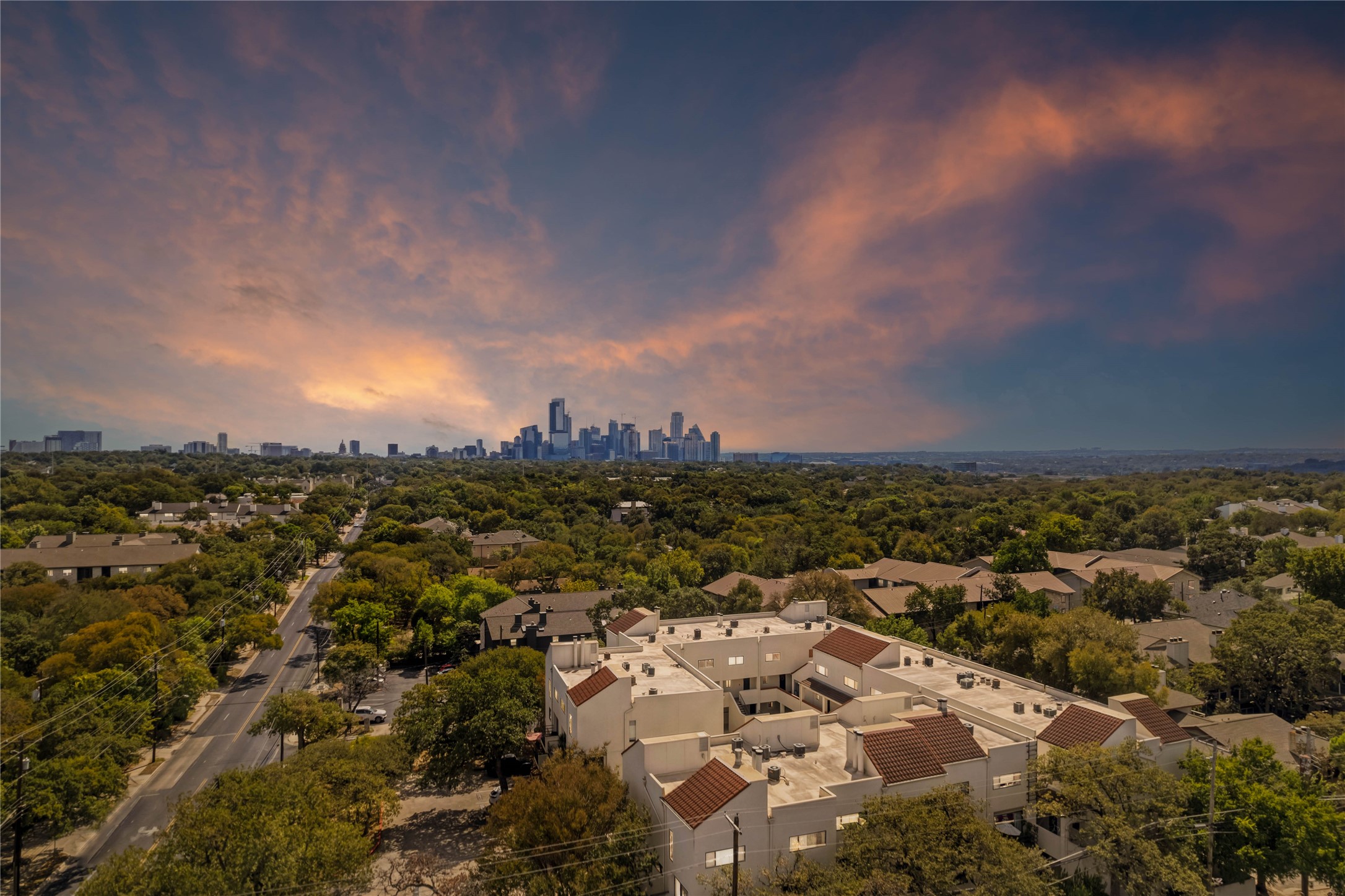 2605 Enfield Road, Unit 221 Austin, TX 78703 - Photo 4 of 30 LOCATION, LOCATION, LOCATION! Located at the corner of Enfield and Exposition. This virtual twilight shot shows the proximity to downtown Austin (2 miles)
