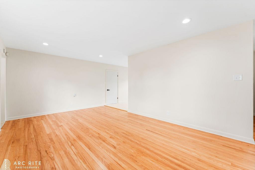 4015 37th Street Lubbock, TX 79413 - Photo 13 of 30 a view of empty room with wooden floor