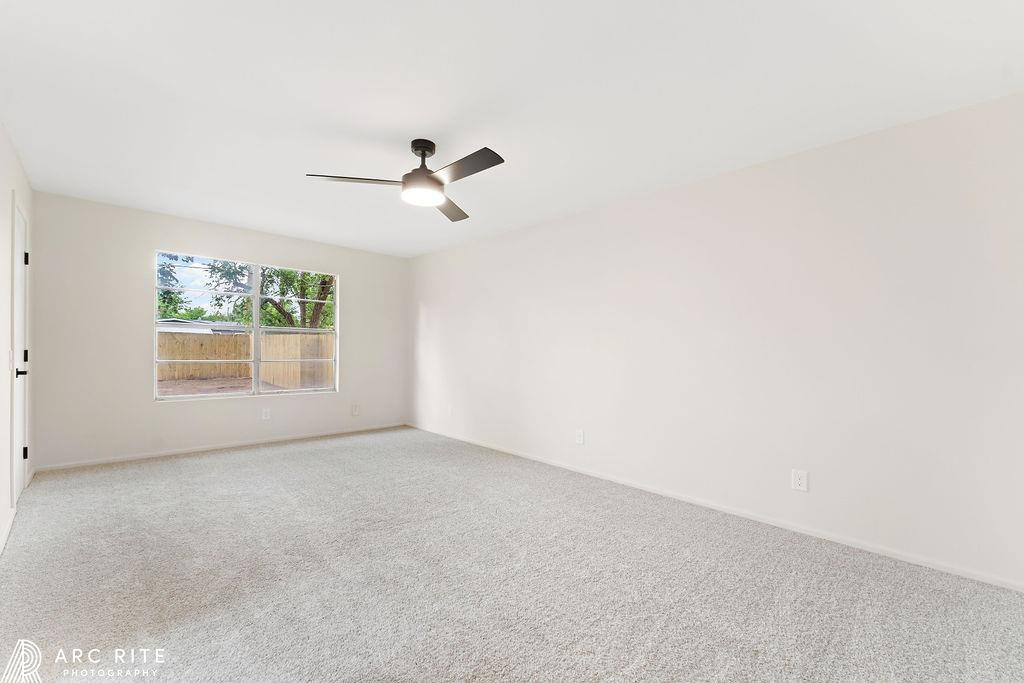 4015 37th Street Lubbock, TX 79413 - Photo 16 of 30 an empty room with windows