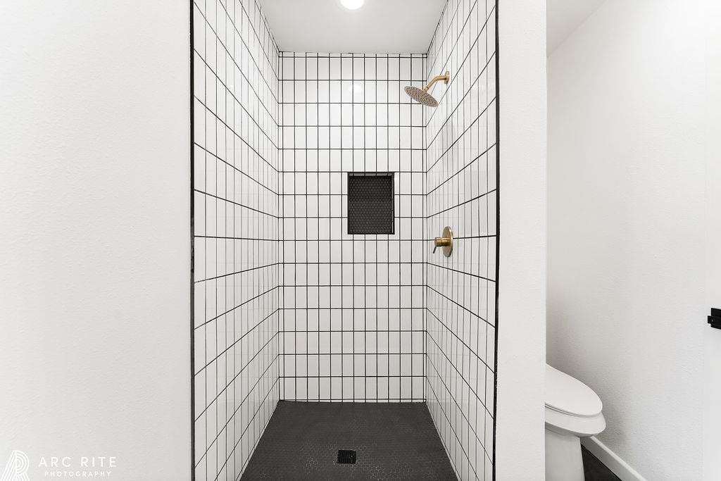 4015 37th Street Lubbock, TX 79413 - Photo 18 of 30 a bathroom with a shower