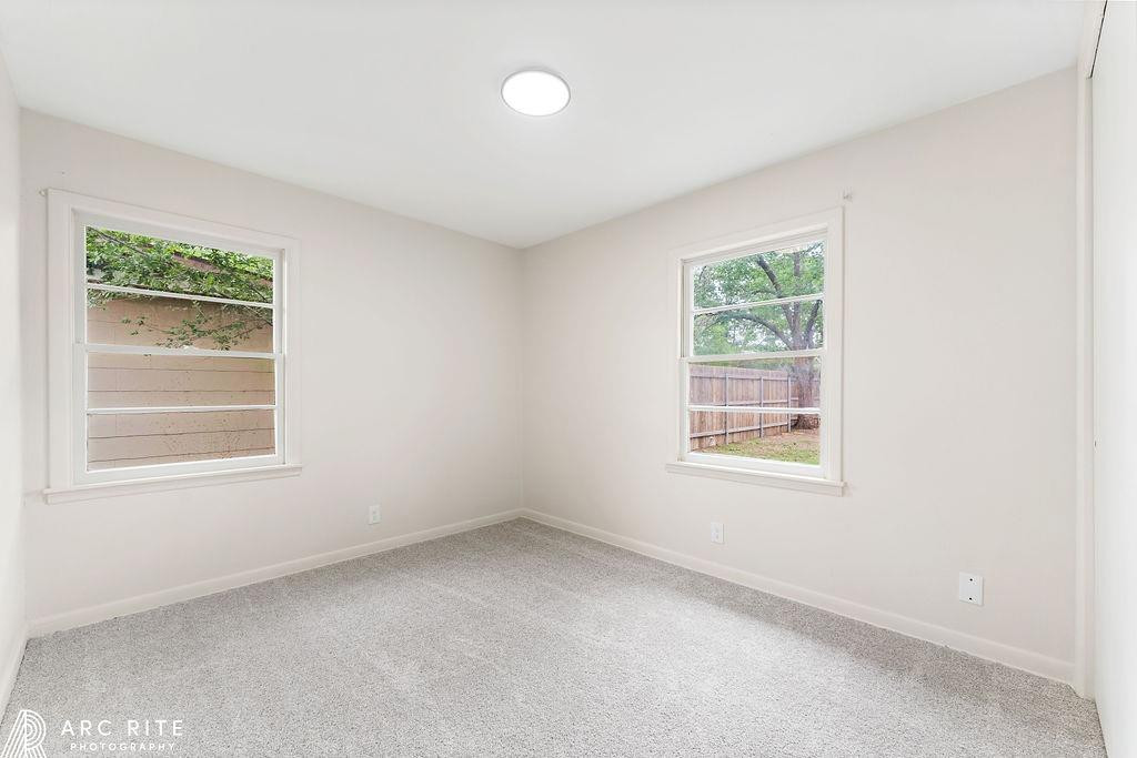 4015 37th Street Lubbock, TX 79413 - Photo 20 of 30 an empty room with a window