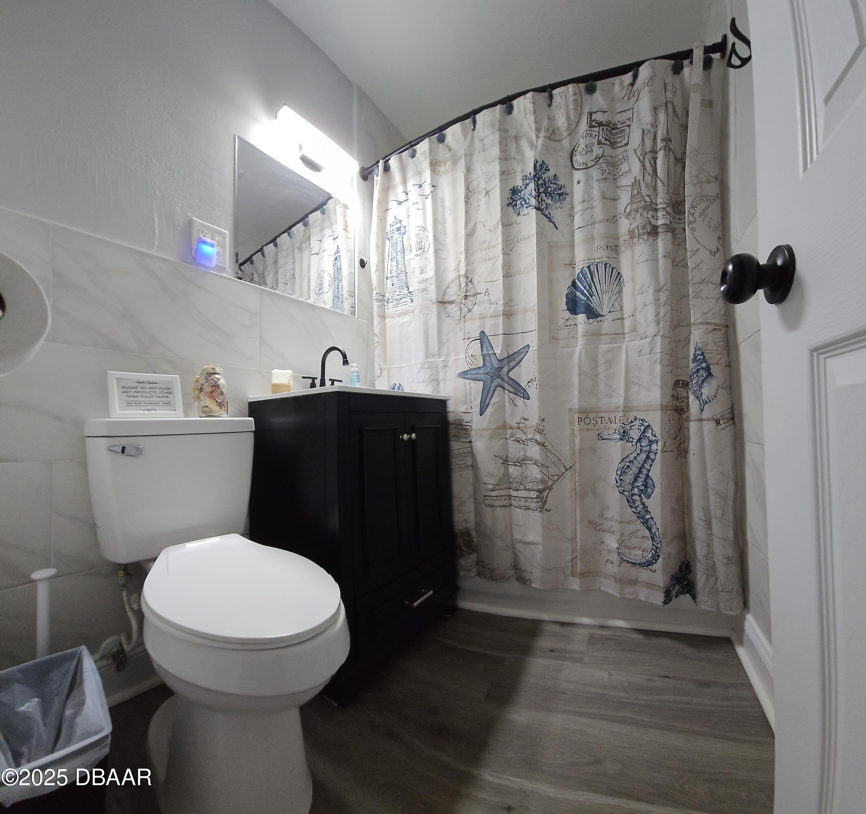 62 Rivershore Drive Ormond Beach, FL 32176 - Photo 22 of 27 a bathroom with a sink and a toilet
