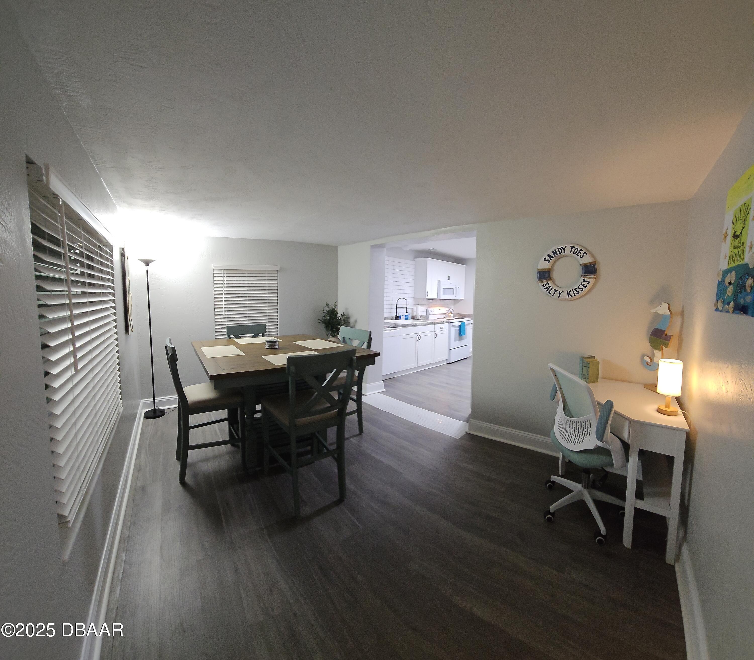 62 Rivershore Drive Ormond Beach, FL 32176 - Photo 4 of 27 a view of a dining room with furniture and a window