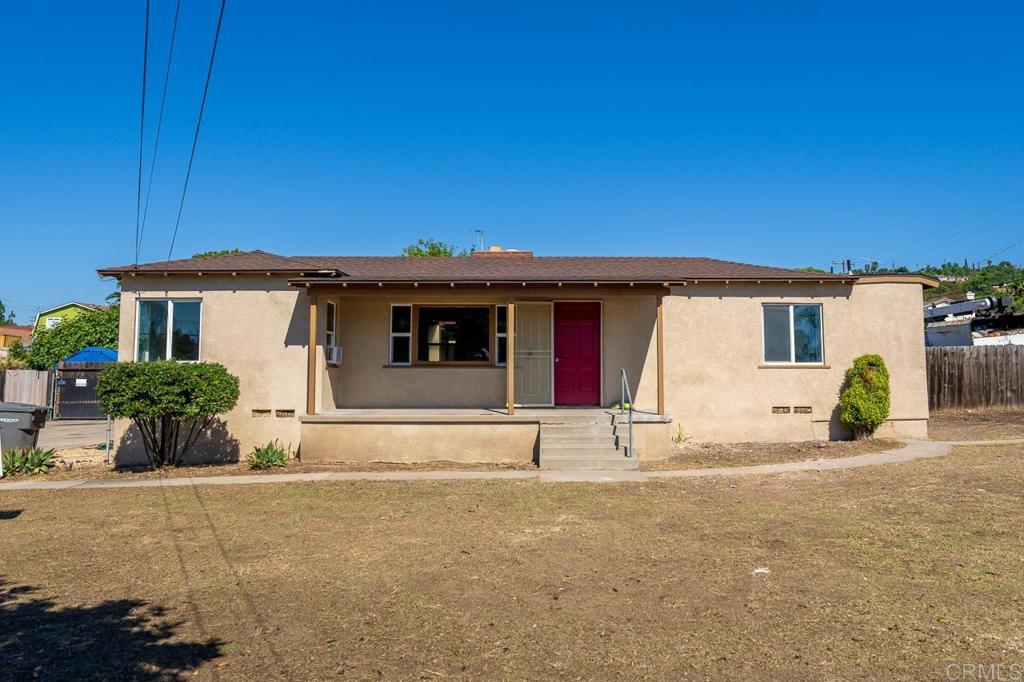 2705 Bancroft Drive Spring Valley, CA 91977 - Photo 1 of 1 a front view of a house with a garden