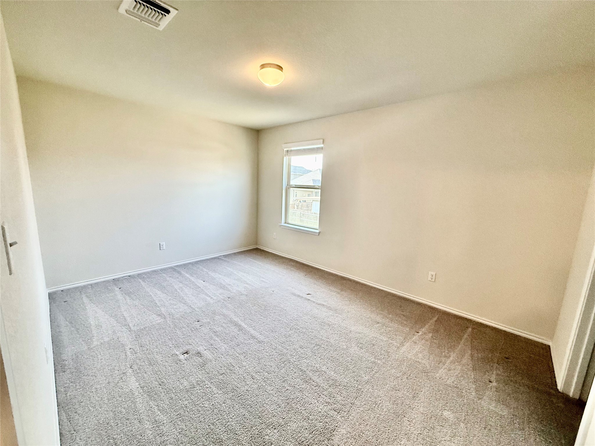 1017 Cliffbrake Way Georgetown, TX 78626 - Photo 20 of 21 Unfurnished room with light carpet and baseboards